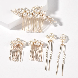 5-piece gold bridal hair accessory set with white pearls on a minimalist white backdrop