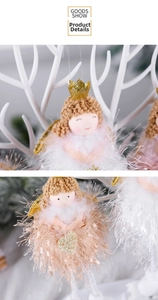 Detail of handcrafted Christmas angel ornaments with knit heads and feather skirts