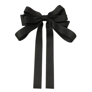 Elegant large black French satin bow hair clip for women with minimalist aesthetic style