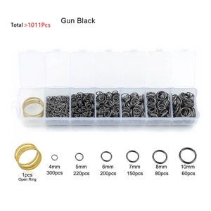 Detail view of DIY jewelry findings kit with black jump rings in a partitioned box
