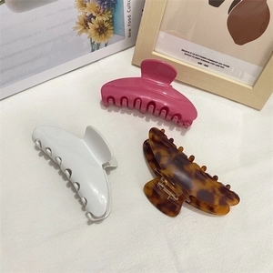 Large acetate shark hair clips in pink, white and tortoiseshell for women ponytail