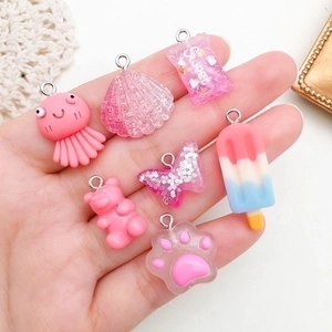 Pink resin pendants set with bear, shell and octopus shapes for DIY jewelry making