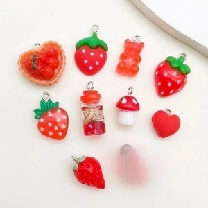 Set of 10 red resin DIY charms featuring strawberry, heart and mushroom designs