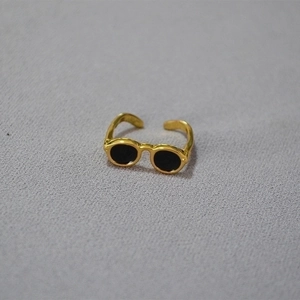 Unique gold brass open ring featuring a cool black sunglasses design for women