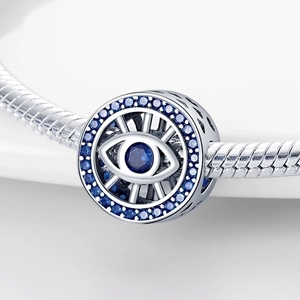 Silver plated Evil Eye charm bead with blue crystals on a snake chain bracelet