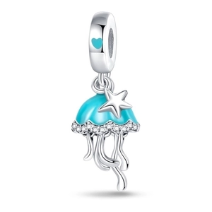 Macro view of silver jellyfish charm with teal enamel and sparkling zircon detail