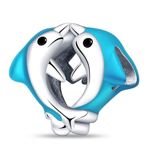 Detail of silver dolphin charm with blue enamel for DIY bracelet and necklace jewelry