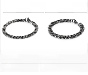 Detail view of 7mm and 9mm vintage black stainless steel Cuban link bracelets for men