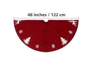 Detail of 48 inch red knit Christmas tree skirt with white reindeer and snowflake pattern