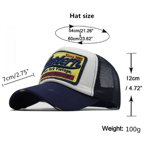 Distressed vintage trucker hat in navy and white with yellow Western embroidery patch