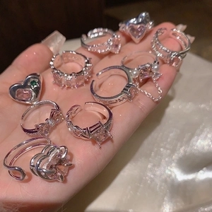 Silver ring set featuring pink heart zircon, bow designs, and pearl accents for women