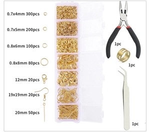 Golden jewelry DIY kit with lobster clasps, jump rings and pliers in a 7-grid storage box