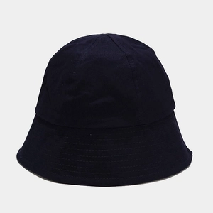 Close-up of high-quality cotton stitching and fabric texture on a navy blue bucket hat