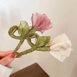 Elegant floral organza hair claws featuring pink rose and white tulip designs