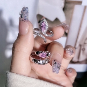 Chic silver-plated snake ring and heart star band featuring sparkling pink zircon gemstones