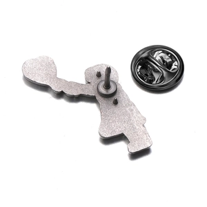 Back view of silver alloy heart girl pin with a secure black rubber clutch fastening