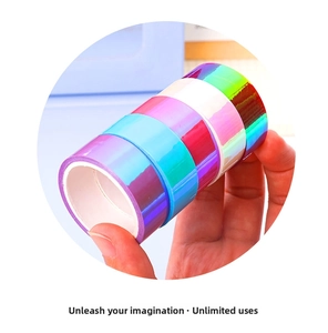 Close-up of five rolls of colorful iridescent laser tapes for creative scrapbooking