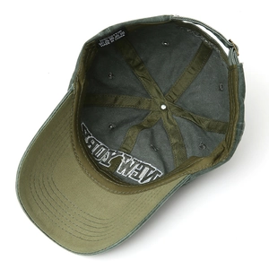 Detail showing internal stitching, 100% cotton wash label and embroidery on baseball cap