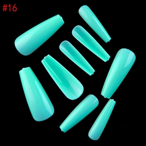 Detail view of turquoise coffin press-on nails with size numbers on black background