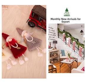 Detailed plush Christmas angel dolls in red, gray, and cream with knit hats and wings