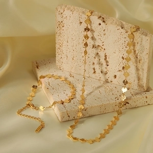 Elegant 18K gold-plated stainless steel necklace and bracelet set with shell pendants