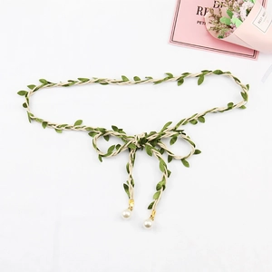 Forest style woven cotton linen waist rope with green leaves and pearl pendant detail