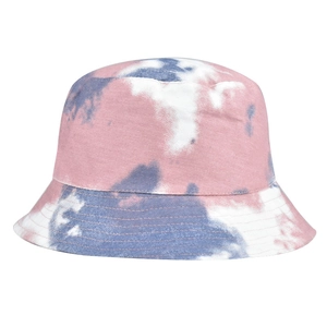 Close-up of tie-dye cotton canvas bucket hat showing pink and blue gradient textures