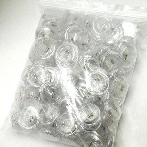Detail shot of magnetic silicone anti-snore nose clips in clear plastic packaging