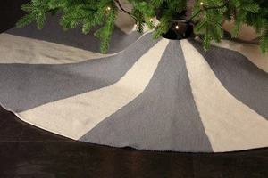 Macro detail of gray and beige knitted stripe pattern on a 48 inch Christmas tree skirt