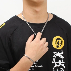 Men's silver stainless steel necklace and bracelet set with unique floral chain design