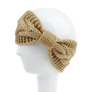Detail view of khaki cable knit headband on mannequin showing thick winter texture