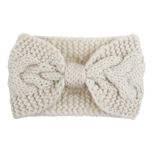 Knitted twist cable headband in cream white featuring a bow knot design for winter warmth