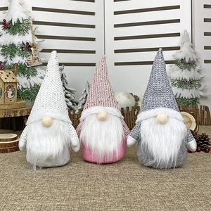 Three-piece Nordic Christmas gnomes set in white, pink, and grey knitted fabric decor