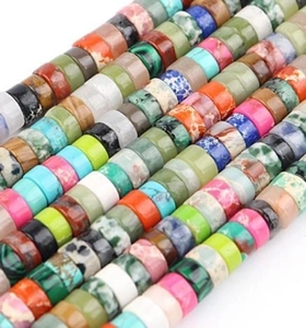 Macro detail of multi-color stone spacer beads for DIY jewelry making and crafting
