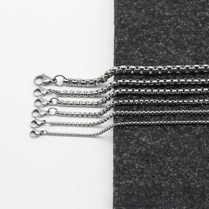 Close-up of stainless steel box chains in six different thicknesses with lobster clasps