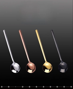 Vertical row of stainless steel coffee spoons in silver, rose gold, gold and black colors