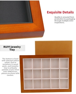 Close-up of a premium 18-grid wooden jewelry display tray with soft beige velvet lining