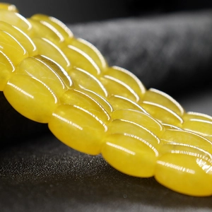 Strand of 8x12mm yellow natural jade oval beads with high glossy finish for DIY jewelry