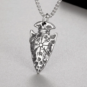 Detail of silver Viking spearhead pendant with Vegvisir compass runes on box chain