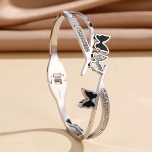 Silver stainless steel butterfly bangle with black zircons and pavé crystal accents