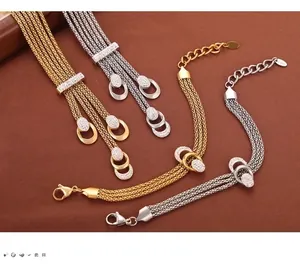Detailed macro of multi-layer mesh chain necklace with crystal-embedded buckle in S.Steel