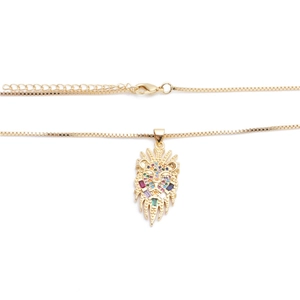 Lion head pendant necklace with multicolored zircon stones on a golden box chain