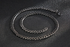 Close-up of a silver 304 stainless steel Cuban chain necklace with a lobster clasp