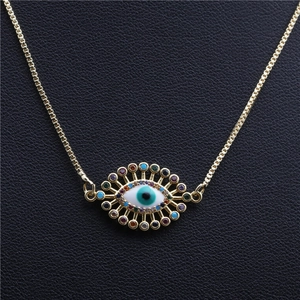 Collana dorata con ciondolo Occhio del Diavolo in zirconi e cristalli colorati