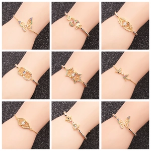 Adjustable gold bracelets for women with zircon butterfly, dragon, and star charms