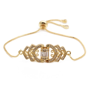 Detailed view of gold adjustable bracelet featuring micro-pave cubic zirconia accents