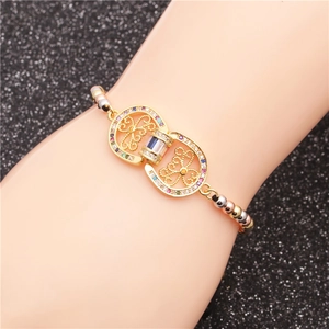 Adjustable gold-plated bracelet with hollow patterns and colorful pavé cubic zirconia