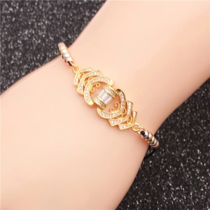 Gold adjustable bracelet with cubic zirconia charms and tri-color beads on black cord