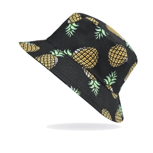 Women's summer black bucket hat with vibrant yellow pineapple print pattern