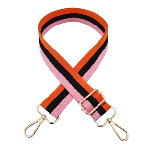 Adjustable rainbow striped bag strap with gold hardware and wide woven fabric design